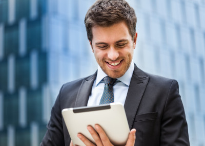 Businessman working on his tablet
